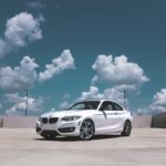 parked white BMW coupe