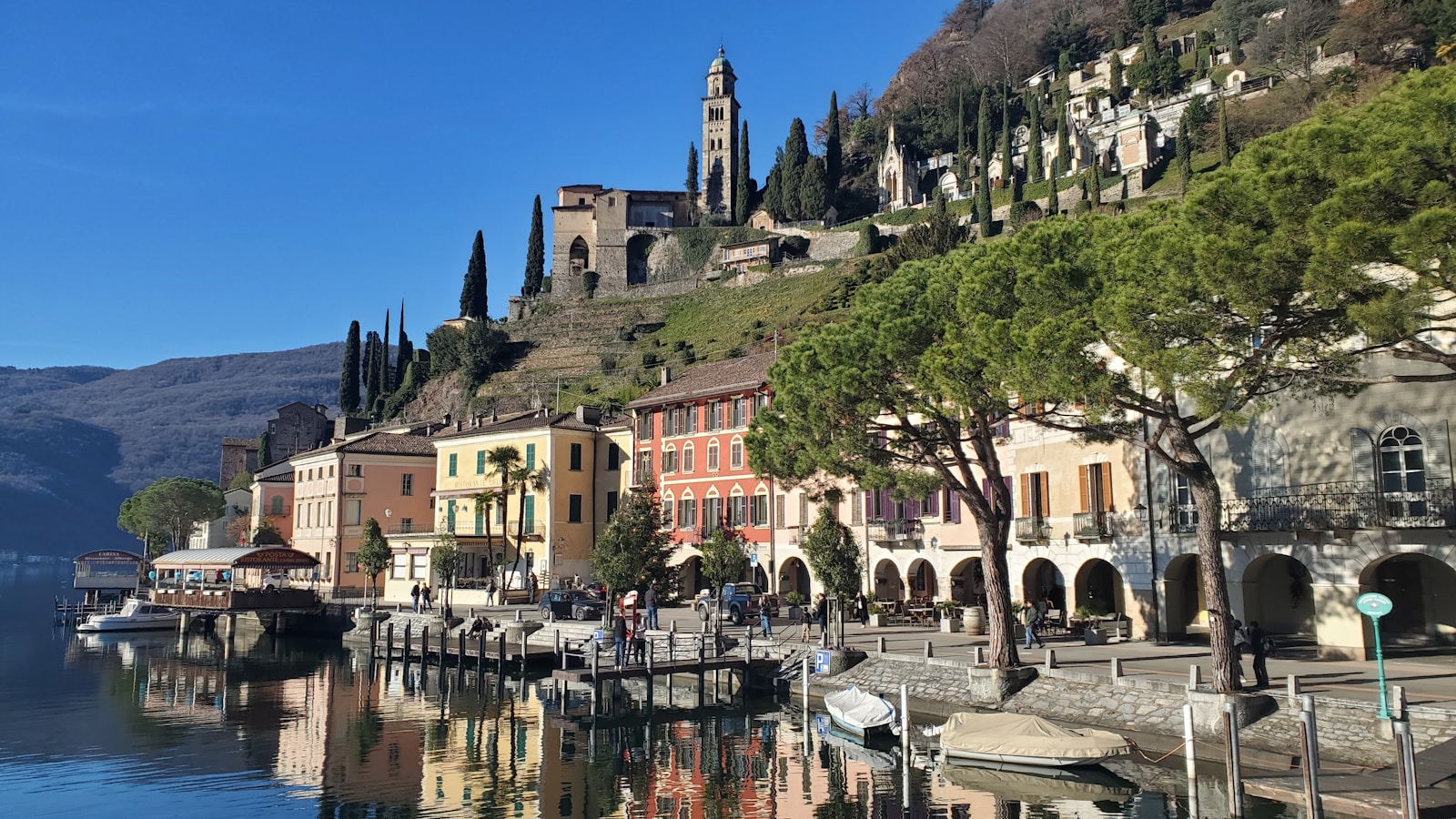 a row of buildings next to a body of water